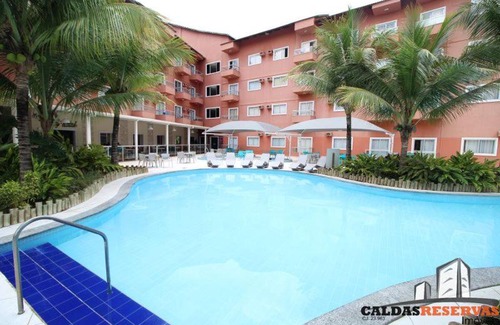 Setor Lagoa Quente Apartment | LAGOA QUENTE HOTEL - Apartamento 229 - 01º Andar - SUÍTE ESMERALDA - 01 quarto, sala, cozinha e banheiro *com fogão*