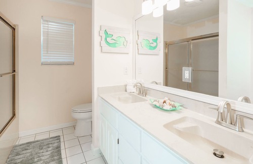 Silver Sands House | Lagoon Hideaway | Waterfront 4BR Home, Pool, Dock, Game Room, Short Walk to Beac