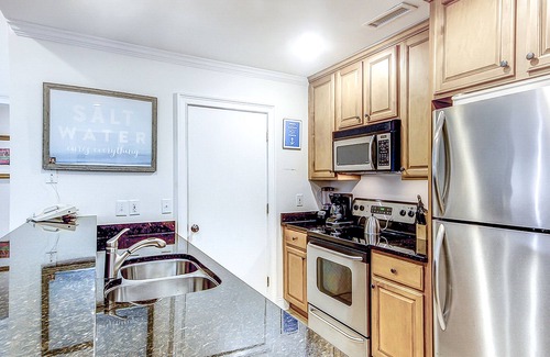 Isle of Palms Villa | Lagoon view condo w/ private balconies, shared pool & basketball - beach access