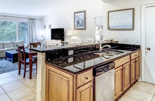 Isle of Palms Villa | Lagoon view condo w/ private balconies, shared pool & basketball - beach access