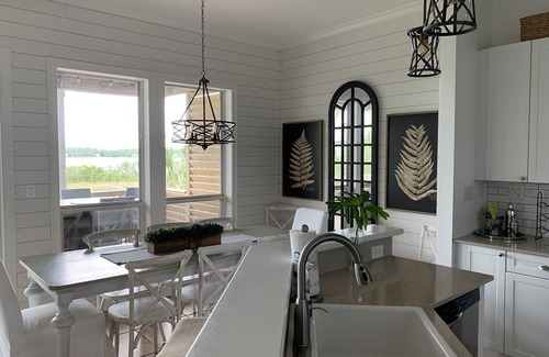 Gulf Shores House | “Lagoonfront Privacy at its Best: Heated Pool, Hot Tub, & Kayaks Included”