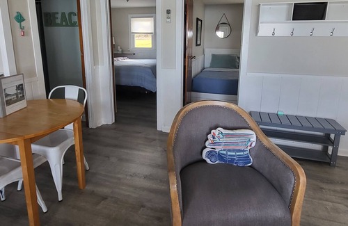 Traverse City Cottage | Lake Leelanau Waterfront Cottage with Mini Harbor - Close to Traverse City!