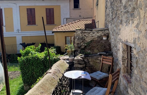 Madonna del Sasso House | Lake Orta: Beautiful & cozy old village house with large loggia & garden