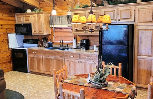 Sylvan Shores Cabin | Lake Shore Cabins on the Waterfront of Beaver Lake with Boat Dock & Swim Deck
