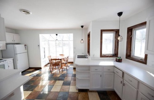 Eastman House | Lake Stuckley country home nestled into Mont Orford