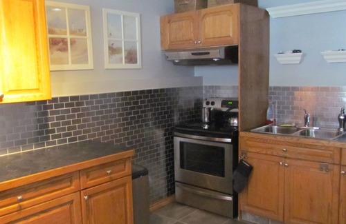 Southeast Calgary House | Lake Sundance - Private Walk Out Suite