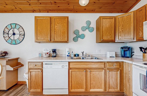 Lake Delton House | Lakefront condo with deck, amazing views, private beach access, fireplace & dock