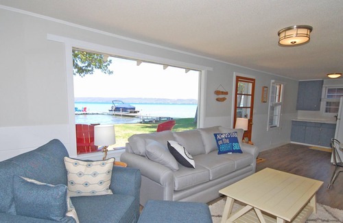 Glen Arbor Cottage | Lakefront cottage with amazing views, a spacious deck, grill, cable & dock