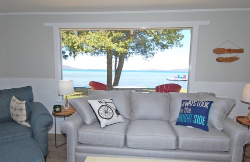 Glen Arbor Cottage | Lakefront cottage with amazing views, a spacious deck, grill, cable & dock
