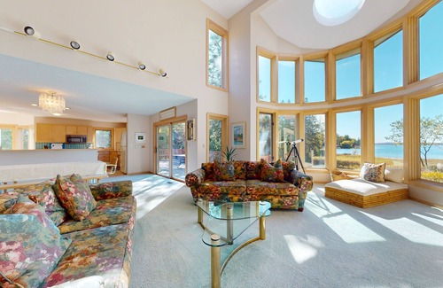 Charlevoix House | Lakefront home on Oyster Bay w/private dock, beach, fire pit, & hammock
