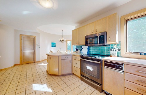 Charlevoix House | Lakefront home on Oyster Bay w/private dock, beach, fire pit, & hammock