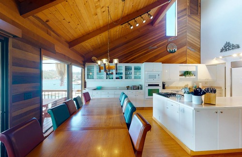 Bass Lake House | Lakefront home w/recreation room, hot tub, central AC, WiFi, private dock, & W/D