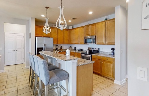 Forestbrook House | Lakefront home with enclosed yard, W/D, central AC & pool