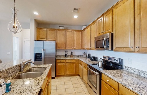 Forestbrook House | Lakefront home with enclosed yard, W/D, central AC & pool