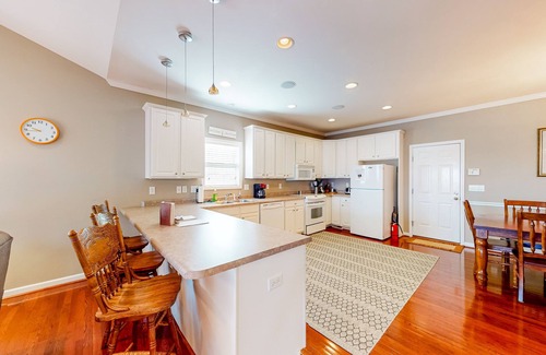 Seneca House | Lakefront home with private dock, boat lift, screened porches, deck, grill, W/D
