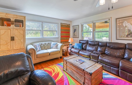 Bumpass House | Lakefront home with spacious deck, dock, game room, hot tub, & sunset views