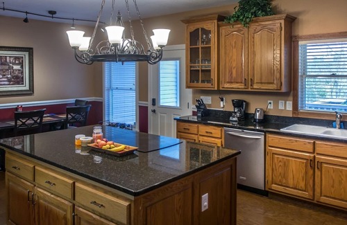 Sevierville House | LAKEFRONT HOUSE SLEEPS 30 - BOAT DOCK, THEATER ROOM, HOT TUB, GAMES ROOM & MORE