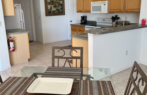 Beachwalk Isles House | Lakefront one-level home with pool, screened lanai & W/D - snowbird-friendly