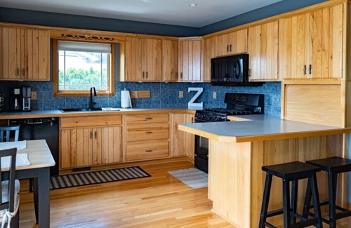 Rapid City Cottage | Lakefront Retreat on Torch Lake Sandbar