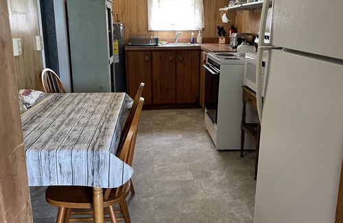 Lochmere Cottage | Lakefront Winnisquam Cottage with dock & boat ramp