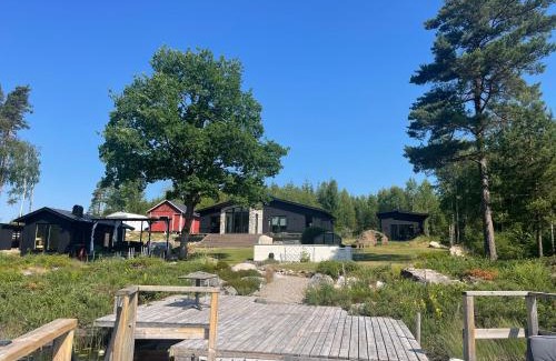 Malsryd House | Lakehouse med bastu, egen brygga och roddbåt