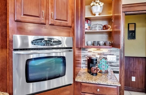 Amherst House | Lakeside 4-Bedroom Retreat with Kids’ Play Area & EV Charger