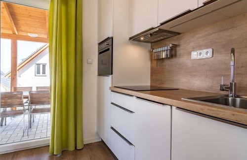 Lojzova Paseka House | Lakeside Village 38 (+ sauna) by Interhome