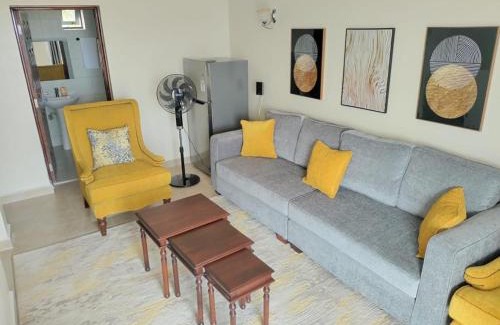 Rusinga Island Apartment | Lakeview Apartments - Serene Mustard