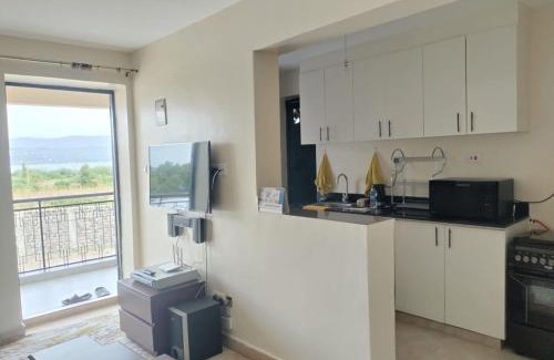 Rusinga Island Apartment | Lakeview Apartments - Serene Mustard