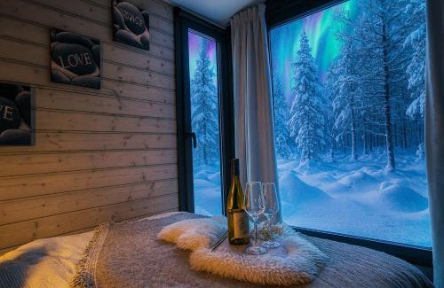 Kolari Ski Chalet | Lapelland Village - Riverside Village with a Nature View, Fireplace, Sauna, Kitchen