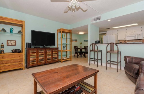 Rockport Condo | Large balcony that overlooks the bay, pool, and fishing pier!