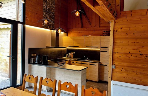 Mont-de-Lans Ski Chalet | Large chalet at the foot of the slopes, 8 bedrooms and 8 bathrooms and sauna