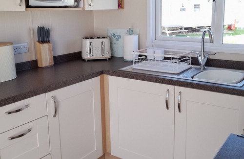 Lossiemouth House | Large Decking 5 Minute Walk to the Beach. explore the Scottish Highlands