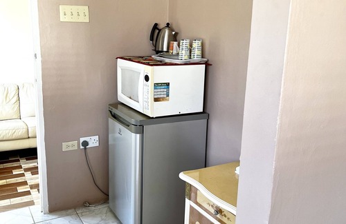 Salt Gut Apartment | Large Deluxe Studio with Balcony 10 minutes drive to Ocho Rios Airport.