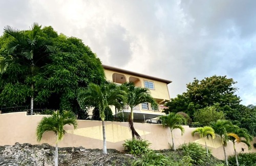 Salt Gut Apartment | Large Deluxe Studio with Balcony 10 minutes drive to Ocho Rios Airport.