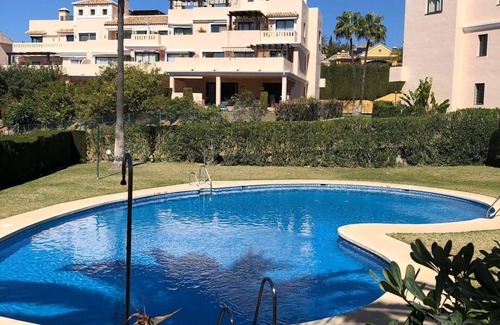 Marbella Apartment | Large High Quality Apartment in Elviria . Large Terrace, Pools and Gardens