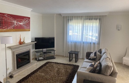 Marbella Apartment | Large High Quality Apartment in Elviria . Large Terrace, Pools and Gardens