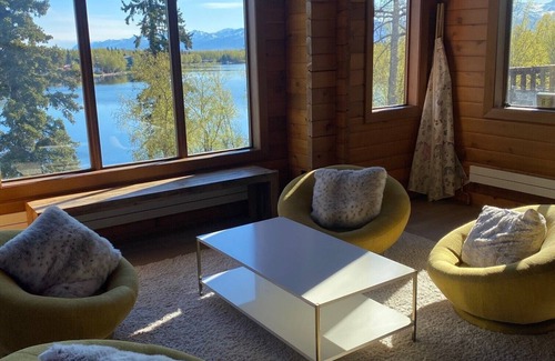 Sand Lake House | Large luxurious lakefront home with water toys & mountain view