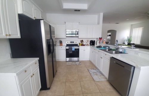 Meadow Woods House | Large Modern 4 Bed 3 Bath Home! Heated Private Pool! Close to Attractions!