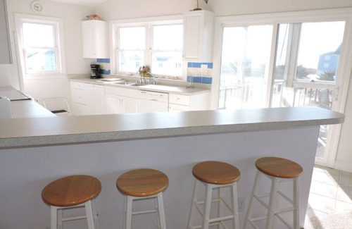 The Point House | Large oceanside home w/elevator located at the Point in Emerald Isle!