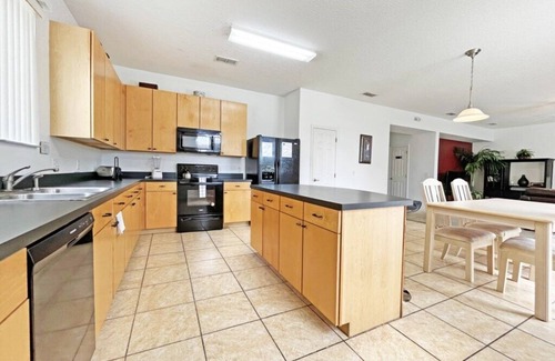 Windwood Bay House | Large villa with games room, private pool and spa near Champions Gate