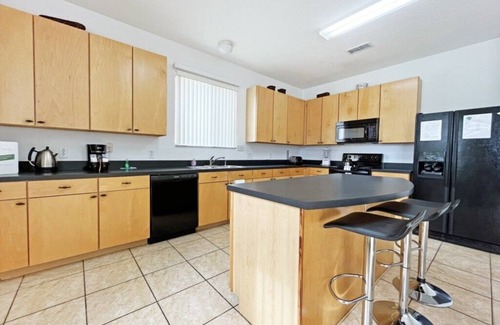 Windwood Bay House | Large villa with games room, private pool and spa near Champions Gate