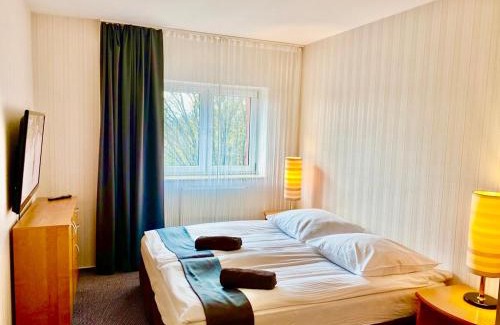 Slupsk Apartment | LAS SŁUPSKI PREMIUM BUSINESS APARTAMENT NR 7 Wifi Netflix Smart TV50 two bedrooms two extra large double beds up to 6 people full pleasure quality stay