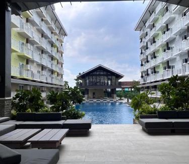 Mactan Export Processing Zone Apartment | Layover Stays 3 mins to Cebu Mactan Airport with Pool and Gym