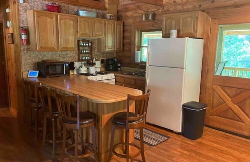 Decatur Cabin | Lazy Spread Cabin. Secluded wooded cabin tucked away with all the amenities