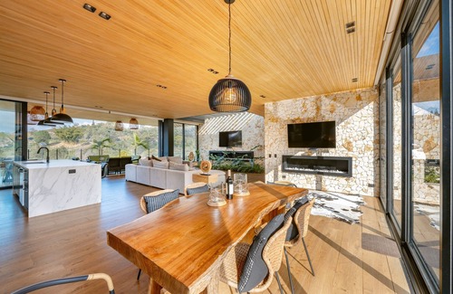 El Penol Villa | Legacy Colombia: Modern Waterfront Luxury + Tennis