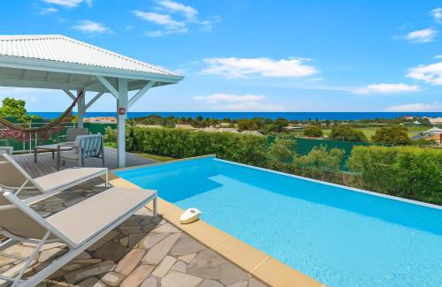 Saint-Francois Villa | Les villas "Fenêtres Sur Plage" - Villas Créoles de charme , vue exceptionnelle face mer et plage & piscines privées à débordement