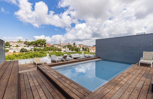 Sao Jose Apartment | Liberdade Elegance W/Rooftop Pool by LovelyStay