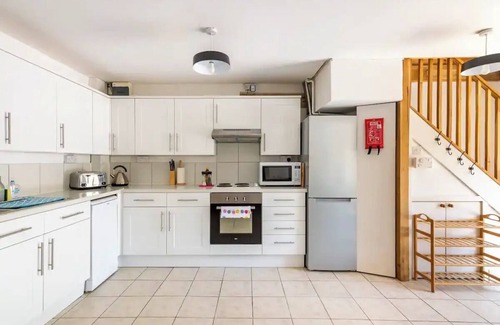 Kemeys Commander Cottage | Light and spacious cottage, with exposed oak beams and floor to ceiling windows