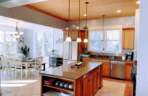 Carrabelle House | Lily’s Escaped, Private screen cover pool, fishing dock,